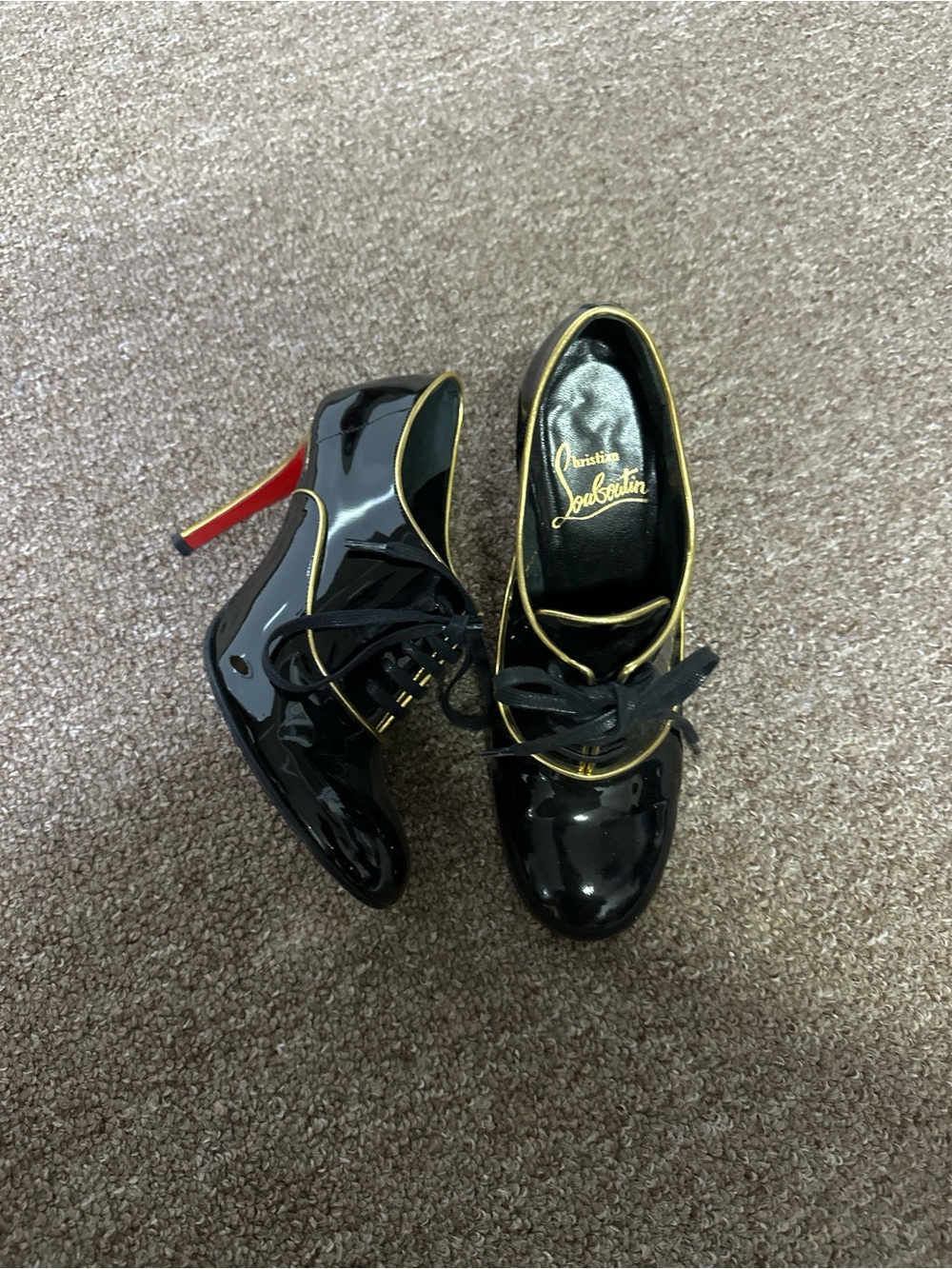 Christian Louboutin Black Patent Lace-Up Pumps with Gold Piping and Red Sole